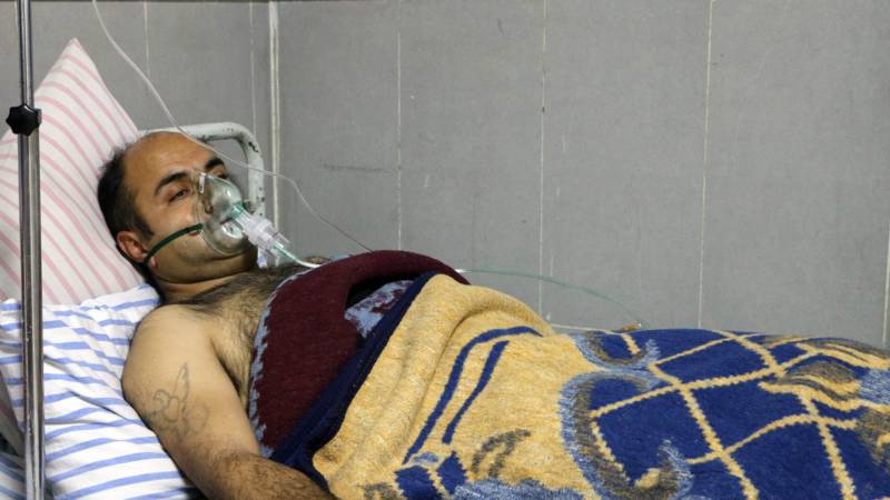 Syrian with breathing problems in Afrin hospital, AFP photo