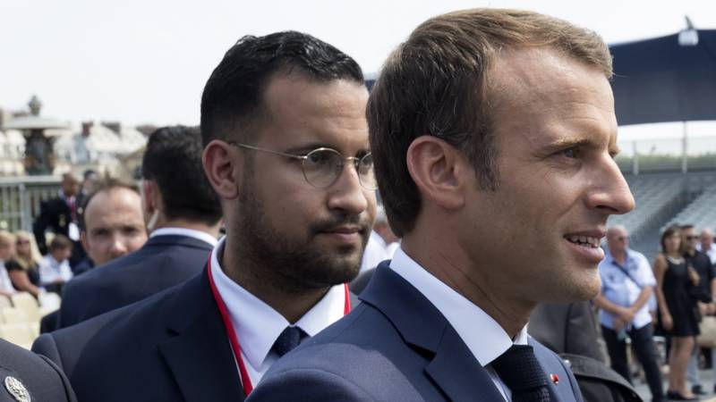 French President Macron and his violent deputy chief of staff Benalla, on 14 July, the national holiday. AFP photo