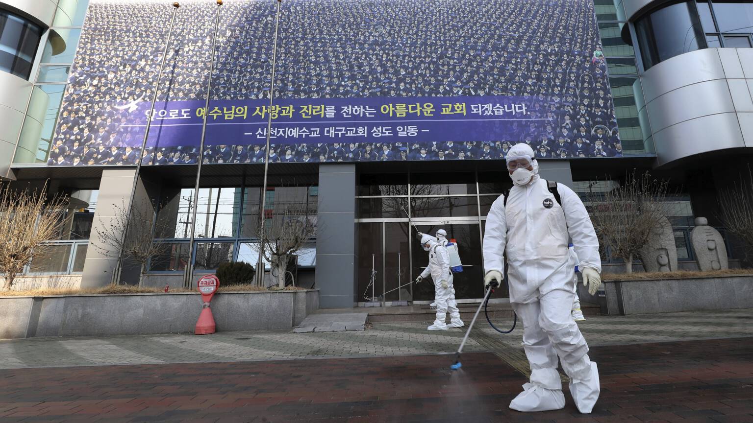 The entrance of the Shincheonji church in Daegu gets coronavirus decontamination, Associated Press photo