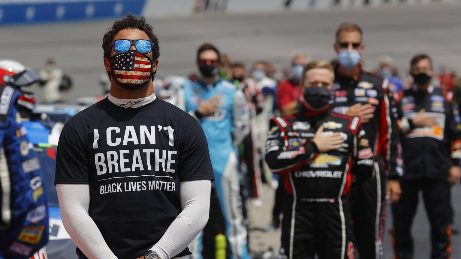 Bubba Wallace (left) wore a T-shirt referring to the death of George Floyd when singing the national anthem before a race on June 6. AFP photo